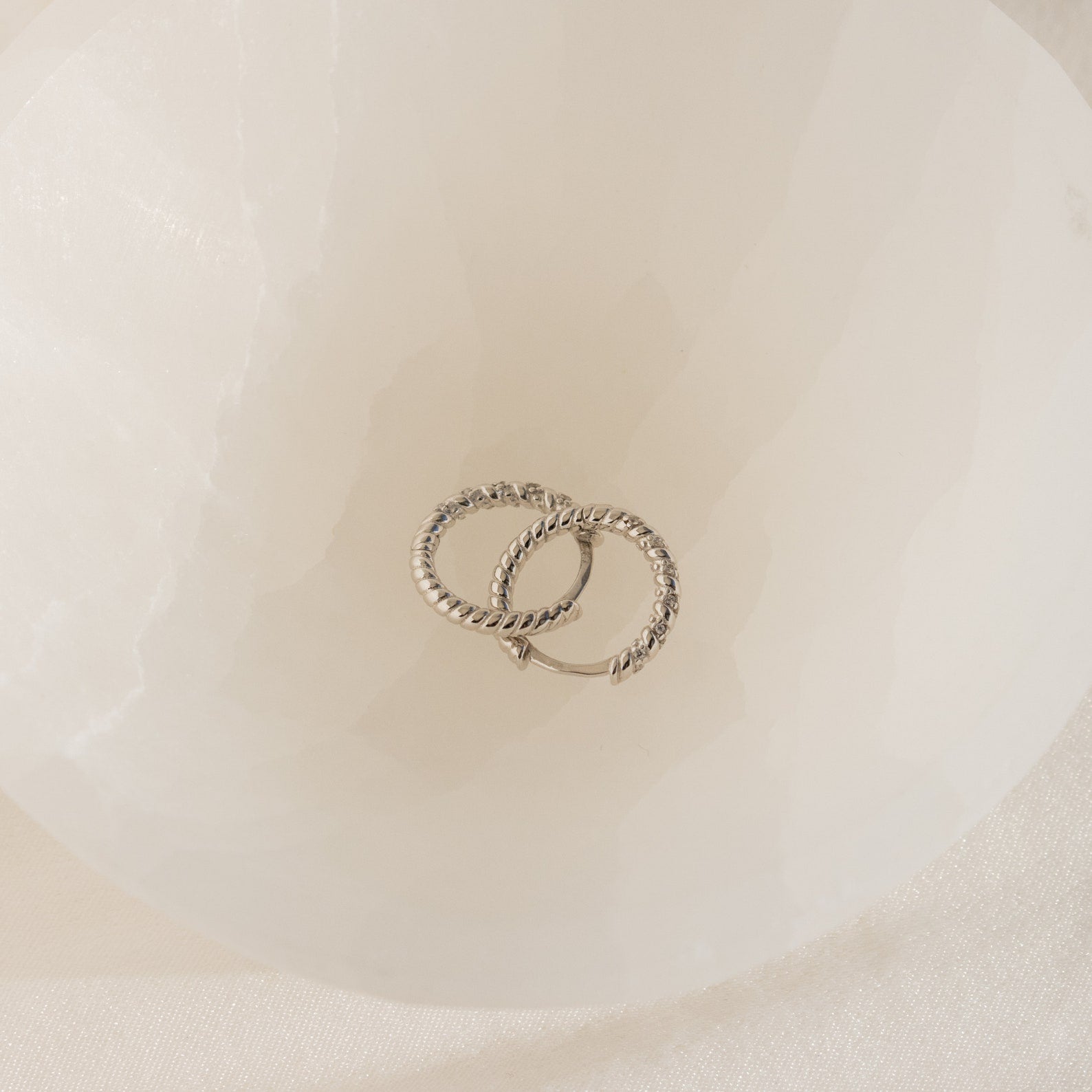 Radiant Revival: Twisted Diamond Hoop Earrings